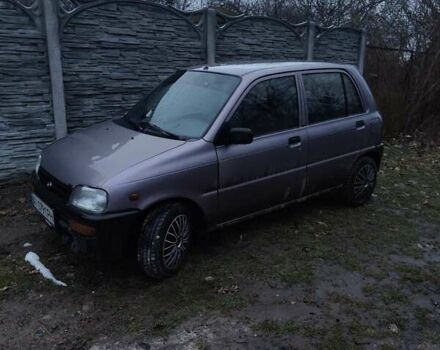 Фиолетовый Дайхатсу Куоре, объемом двигателя 0.85 л и пробегом 155 тыс. км за 2000 $, фото 4 на Automoto.ua