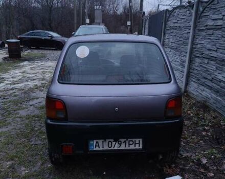 Фиолетовый Дайхатсу Куоре, объемом двигателя 0.85 л и пробегом 155 тыс. км за 2000 $, фото 1 на Automoto.ua