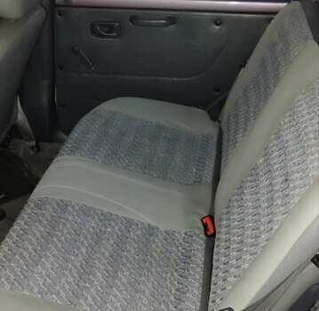 Фиолетовый Дайхатсу Куоре, объемом двигателя 0.85 л и пробегом 155 тыс. км за 2000 $, фото 2 на Automoto.ua