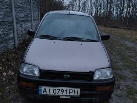 Фиолетовый Дайхатсу Куоре, объемом двигателя 0.85 л и пробегом 155 тыс. км за 2000 $, фото 1 на Automoto.ua