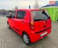 Красный Дайхатсу Куоре, объемом двигателя 1 л и пробегом 205 тыс. км за 2900 $, фото 3 на Automoto.ua