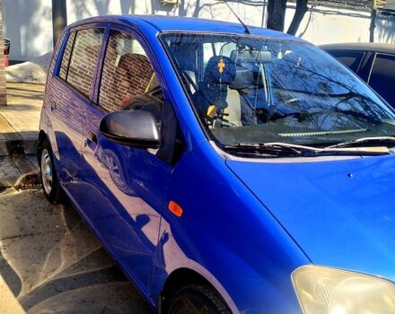 Синий Дайхатсу Куоре, объемом двигателя 1 л и пробегом 150 тыс. км за 2500 $, фото 1 на Automoto.ua