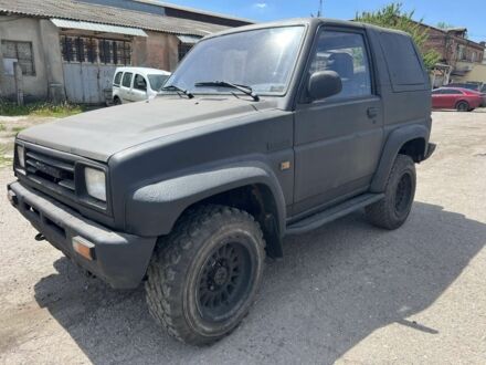 Дайхатсу Rocky 1996 у Харкові на Automoto.ua Чорний Дайхатсу Rocky, об'ємом двигуна 2 л та пробігом 289 тис. км за 1900 $, фото 1 на Automoto.ua