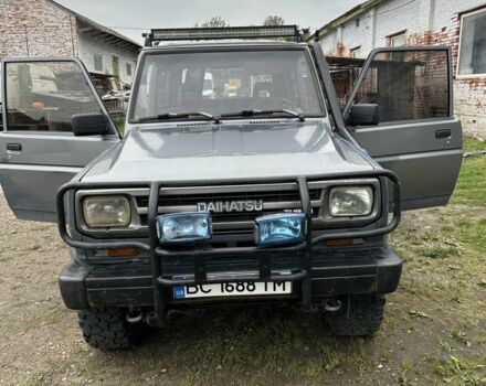 Серый Дайхатсу Роки, объемом двигателя 2.8 л и пробегом 300 тыс. км за 5500 $, фото 1 на Automoto.ua