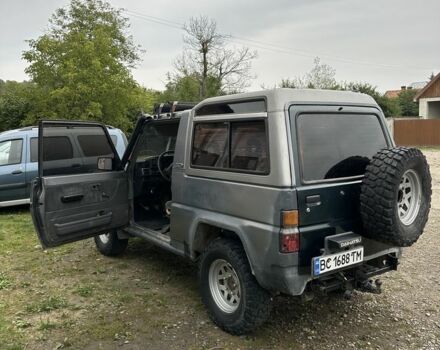 Серый Дайхатсу Роки, объемом двигателя 2.8 л и пробегом 300 тыс. км за 5500 $, фото 5 на Automoto.ua