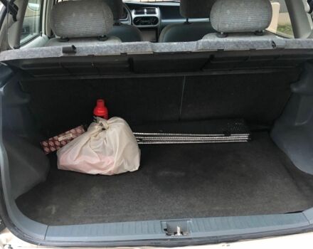 Білий Дайхатсу Sirion, об'ємом двигуна 1 л та пробігом 166 тис. км за 3300 $, фото 6 на Automoto.ua