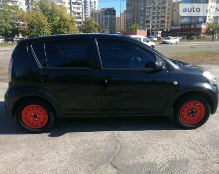 Чорний Дайхатсу Sirion, об'ємом двигуна 1 л та пробігом 135 тис. км за 4000 $, фото 21 на Automoto.ua