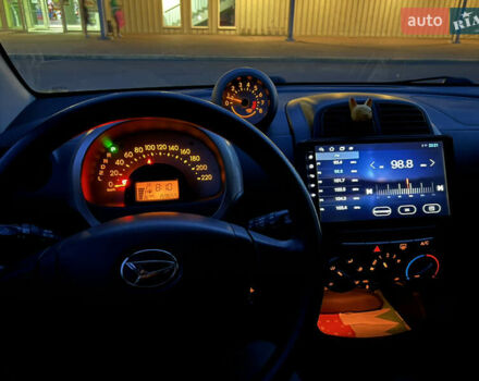 Чорний Дайхатсу Sirion, об'ємом двигуна 1.3 л та пробігом 159 тис. км за 5900 $, фото 5 на Automoto.ua