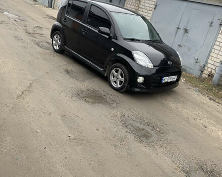 Чорний Дайхатсу Sirion, об'ємом двигуна 1.3 л та пробігом 159 тис. км за 5900 $, фото 2 на Automoto.ua