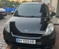 Чорний Дайхатсу Sirion, об'ємом двигуна 1.3 л та пробігом 223 тис. км за 5500 $, фото 1 на Automoto.ua