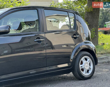Чорний Дайхатсу Sirion, об'ємом двигуна 1 л та пробігом 116 тис. км за 4200 $, фото 11 на Automoto.ua