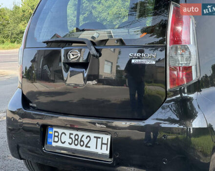 Чорний Дайхатсу Sirion, об'ємом двигуна 1 л та пробігом 116 тис. км за 4200 $, фото 10 на Automoto.ua