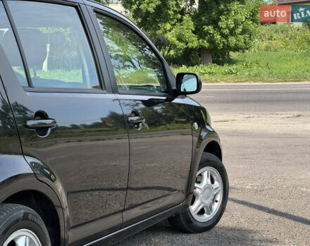 Чорний Дайхатсу Sirion, об'ємом двигуна 1 л та пробігом 116 тис. км за 4200 $, фото 9 на Automoto.ua