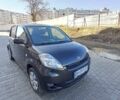 Черный Дайхатсу Сирион, объемом двигателя 1 л и пробегом 170 тыс. км за 4200 $, фото 1 на Automoto.ua