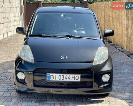 Чорний Дайхатсу Sirion, об'ємом двигуна 1.3 л та пробігом 159 тис. км за 5900 $, фото 1 на Automoto.ua