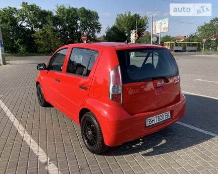 Червоний Дайхатсу Sirion, об'ємом двигуна 1 л та пробігом 79 тис. км за 5599 $, фото 10 на Automoto.ua