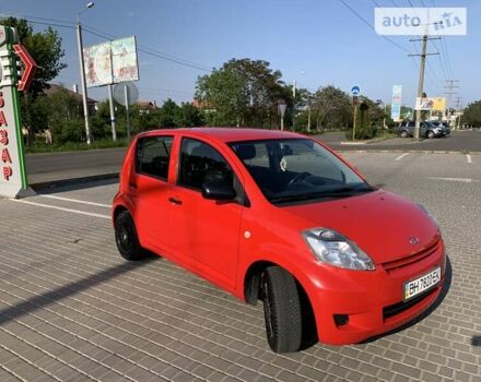 Червоний Дайхатсу Sirion, об'ємом двигуна 1 л та пробігом 79 тис. км за 5599 $, фото 14 на Automoto.ua