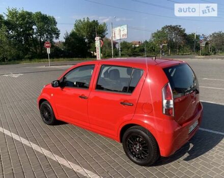 Червоний Дайхатсу Sirion, об'ємом двигуна 1 л та пробігом 79 тис. км за 5599 $, фото 12 на Automoto.ua