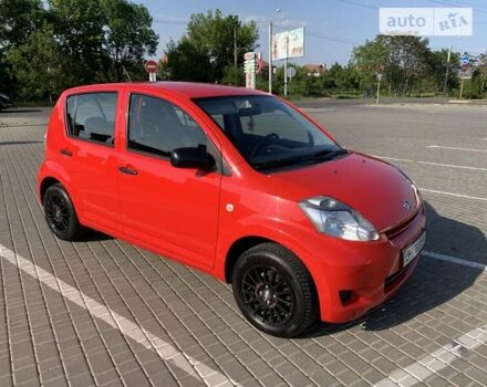 Червоний Дайхатсу Sirion, об'ємом двигуна 1 л та пробігом 79 тис. км за 5599 $, фото 7 на Automoto.ua