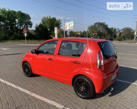 Червоний Дайхатсу Sirion, об'ємом двигуна 1 л та пробігом 79 тис. км за 5599 $, фото 11 на Automoto.ua