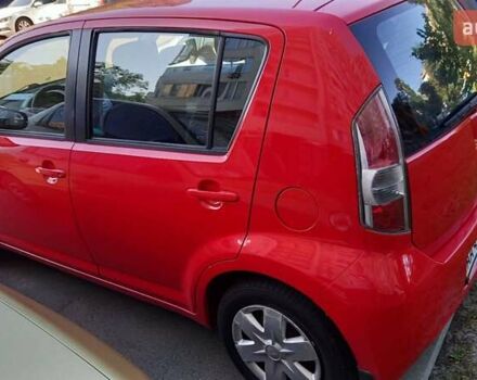 Красный Дайхатсу Сирион, объемом двигателя 1.3 л и пробегом 187 тыс. км за 5700 $, фото 1 на Automoto.ua