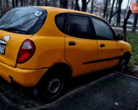 Желтый Дайхатсу Сирион, объемом двигателя 1 л и пробегом 220 тыс. км за 1700 $, фото 4 на Automoto.ua