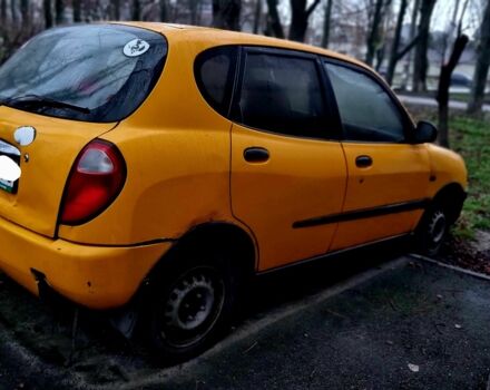 Желтый Дайхатсу Сирион, объемом двигателя 1 л и пробегом 220 тыс. км за 1700 $, фото 2 на Automoto.ua