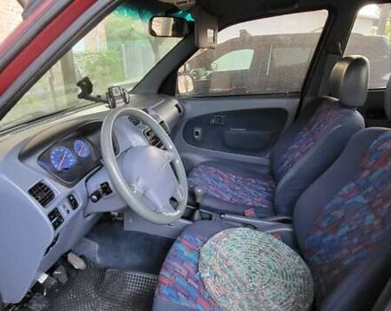 Дайхатсу Териос 1997 в Харькове на Automoto.ua Красный Дайхатсу Териос, объемом двигателя 1.3 л и пробегом 198 тыс. км за 3200 $, фото 2 на Automoto.ua