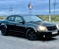 Черный Додж Авенджер, объемом двигателя 2 л и пробегом 250 тыс. км за 4399 $, фото 4 на Automoto.ua
