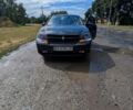 Черный Додж Авенджер, объемом двигателя 2 л и пробегом 287 тыс. км за 4600 $, фото 1 на Automoto.ua