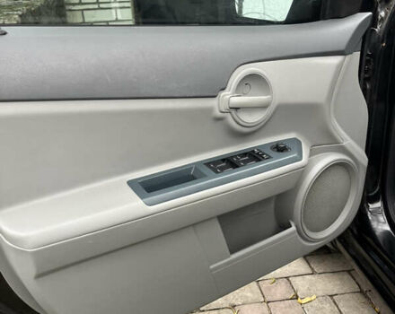 Чорний Додж Avenger, об'ємом двигуна 2 л та пробігом 155 тис. км за 6500 $, фото 28 на Automoto.ua