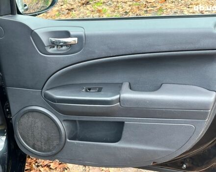 Чорний Додж Caliber, об'ємом двигуна 2 л та пробігом 317 тис. км за 6240 $, фото 14 на Automoto.ua