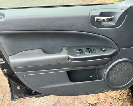 Чорний Додж Caliber, об'ємом двигуна 2 л та пробігом 317 тис. км за 6240 $, фото 24 на Automoto.ua