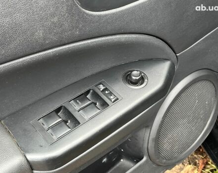 Чорний Додж Caliber, об'ємом двигуна 2 л та пробігом 317 тис. км за 6240 $, фото 29 на Automoto.ua