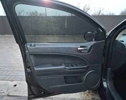 Чорний Додж Caliber, об'ємом двигуна 2.4 л та пробігом 177 тис. км за 7899 $, фото 1 на Automoto.ua