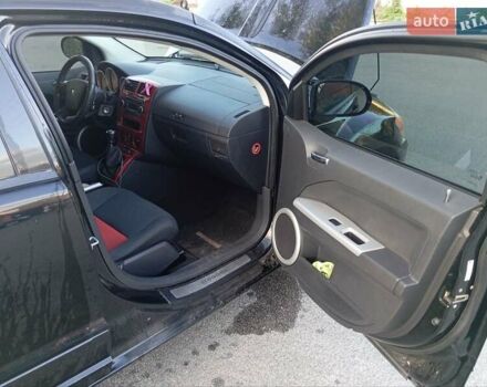 Черный Додж Калибер, объемом двигателя 2 л и пробегом 236 тыс. км за 6499 $, фото 11 на Automoto.ua