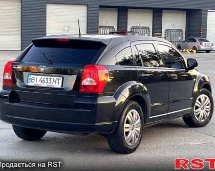 Черный Додж Калибер, объемом двигателя 1.8 л и пробегом 250 тыс. км за 5600 $, фото 8 на Automoto.ua