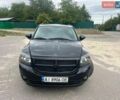 Чорний Додж Caliber, об'ємом двигуна 2 л та пробігом 261 тис. км за 5500 $, фото 1 на Automoto.ua