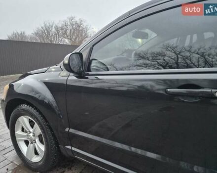 Черный Додж Калибер, объемом двигателя 2.36 л и пробегом 177 тыс. км за 7899 $, фото 28 на Automoto.ua