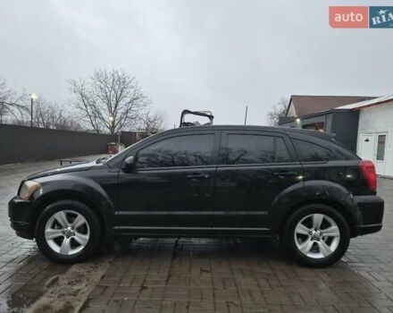 Черный Додж Калибер, объемом двигателя 2.36 л и пробегом 177 тыс. км за 7899 $, фото 26 на Automoto.ua