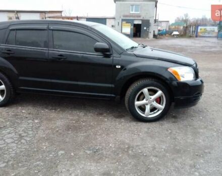 Черный Додж Калибер, объемом двигателя 1.8 л и пробегом 220 тыс. км за 5600 $, фото 1 на Automoto.ua