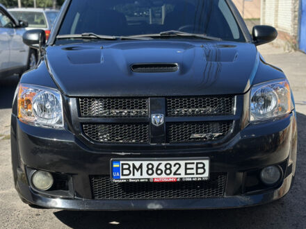 Черный Додж Калибер, объемом двигателя 2.4 л и пробегом 178 тыс. км за 8500 $, фото 1 на Automoto.ua