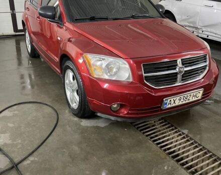 Красный Додж Калибер, объемом двигателя 2 л и пробегом 250 тыс. км за 4999 $, фото 1 на Automoto.ua