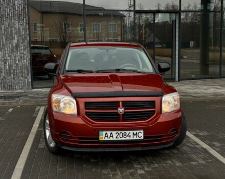 Красный Додж Калибер, объемом двигателя 2 л и пробегом 257 тыс. км за 5750 $, фото 1 на Automoto.ua