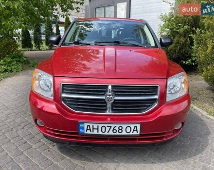 Красный Додж Калибер, объемом двигателя 2 л и пробегом 192 тыс. км за 6600 $, фото 1 на Automoto.ua
