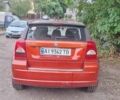 Красный Додж Калибер, объемом двигателя 2 л и пробегом 204 тыс. км за 5500 $, фото 1 на Automoto.ua