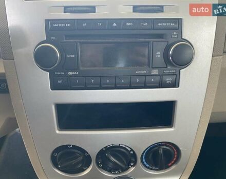 Красный Додж Калибер, объемом двигателя 2 л и пробегом 206 тыс. км за 6900 $, фото 21 на Automoto.ua