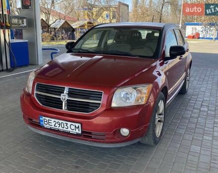 Красный Додж Калибер, объемом двигателя 2 л и пробегом 206 тыс. км за 6900 $, фото 1 на Automoto.ua