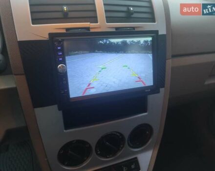 Красный Додж Калибер, объемом двигателя 1.8 л и пробегом 250 тыс. км за 5500 $, фото 27 на Automoto.ua