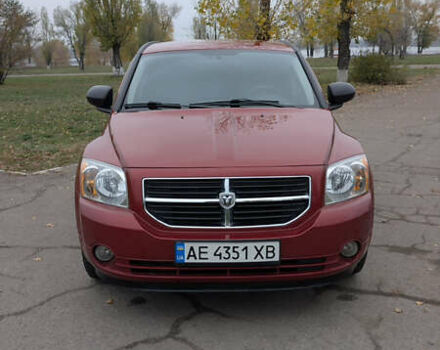 Красный Додж Калибер, объемом двигателя 2 л и пробегом 205 тыс. км за 7800 $, фото 1 на Automoto.ua